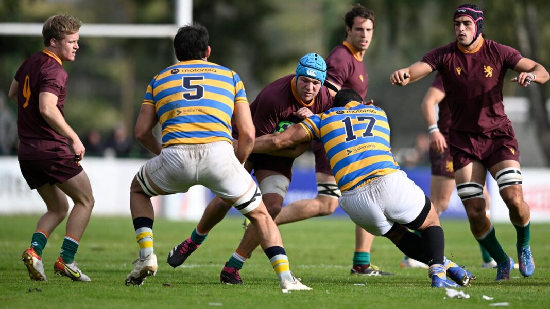 Jugadores de Newman celebrando un try ante Hindú en el partido de la séptima fecha del Top 14 de la URBA