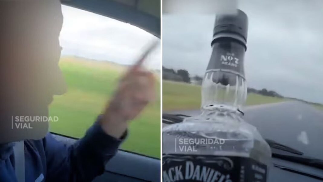 Conductor tomando whisky mientras maneja en la Ruta 2